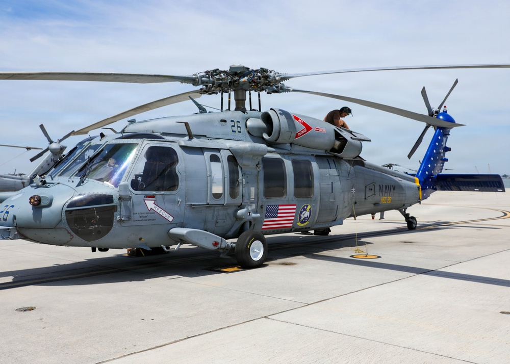 HSC-26 show off completed painted side panels of their MH-60S Seahawk helicopter