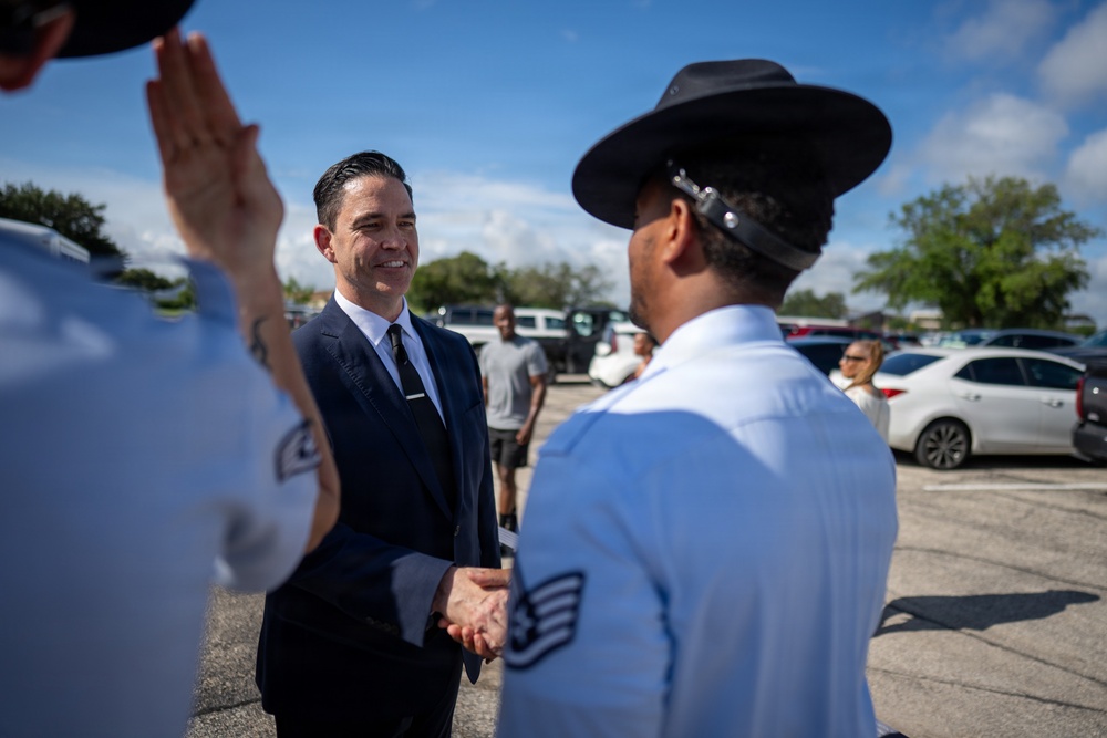 Assistant Secretary of the Air Force Michael Borders Reviews BMT Graduation Parade at JBSA-Lackland