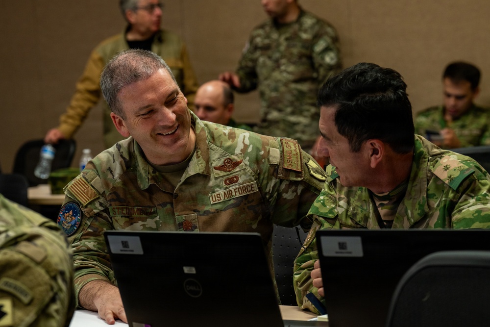 U.S. and Partner Forces Work Together During Command Post Exercise of RC26