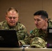 U.S. Army Soldier and Kazakhstan Partner Collaborate During Command Post Exercise of RC26