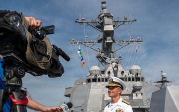 Vice Adm. Doug Perry participates in Wavy10 interview aboard DDG 128