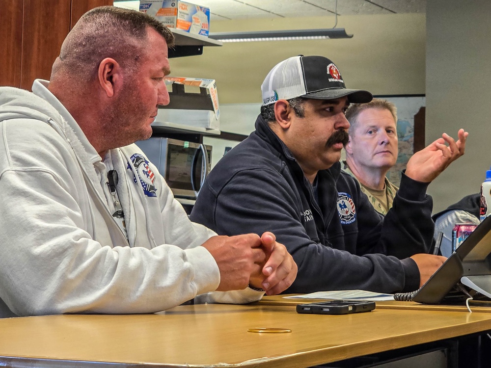 Camp Guernsey Fire Department discuss resource coordination