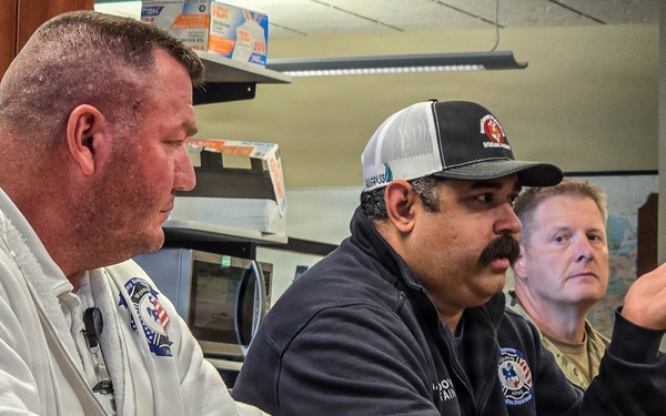 Camp Guernsey Fire Department discuss resource coordination