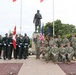 U.S. Navy Sailors and National Guard of Denmark stand together at the Danish Sailor Memorial