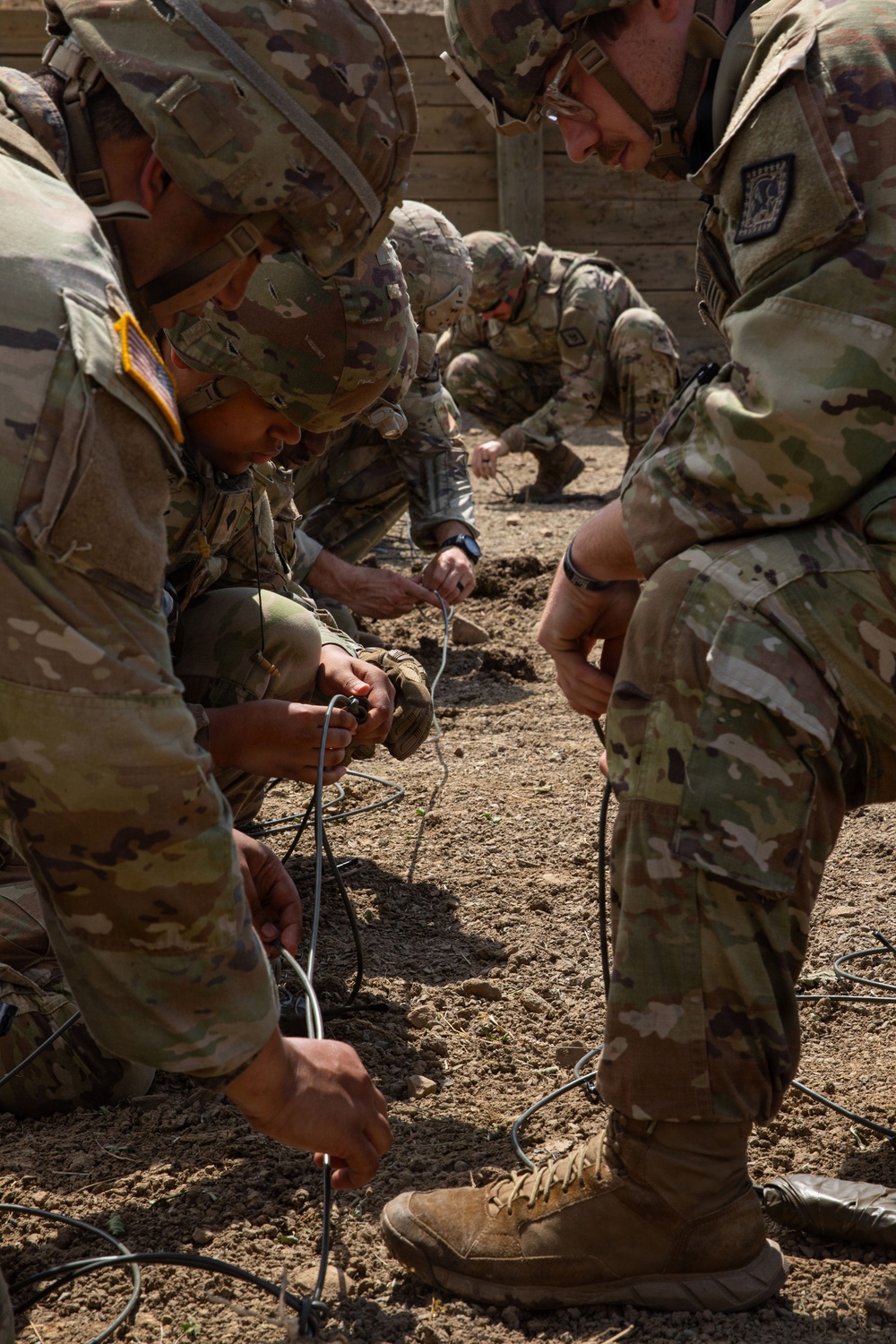 Engineers detonate confidence, shape and crater charges.