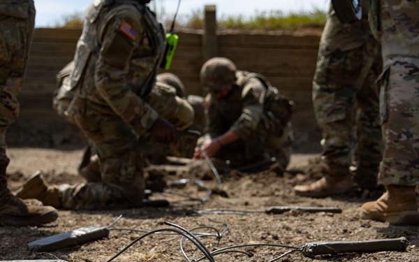 Engineers detonate confidence, shape and crater charges.