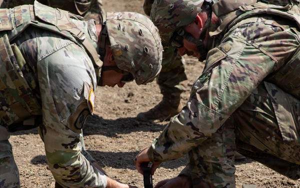 Engineers detonate confidence, shape and crater charges.