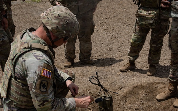 Engineers detonate confidence, shape and crater charges.