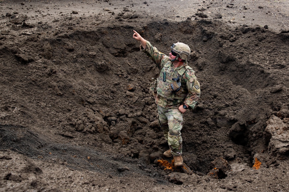 Engineers detonate confidence, shape and crater charges.