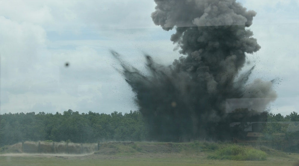 Engineers detonate confidence, shape and crater charges.