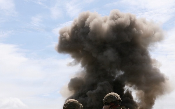 Engineers detonate confidence, shape and crater charges.