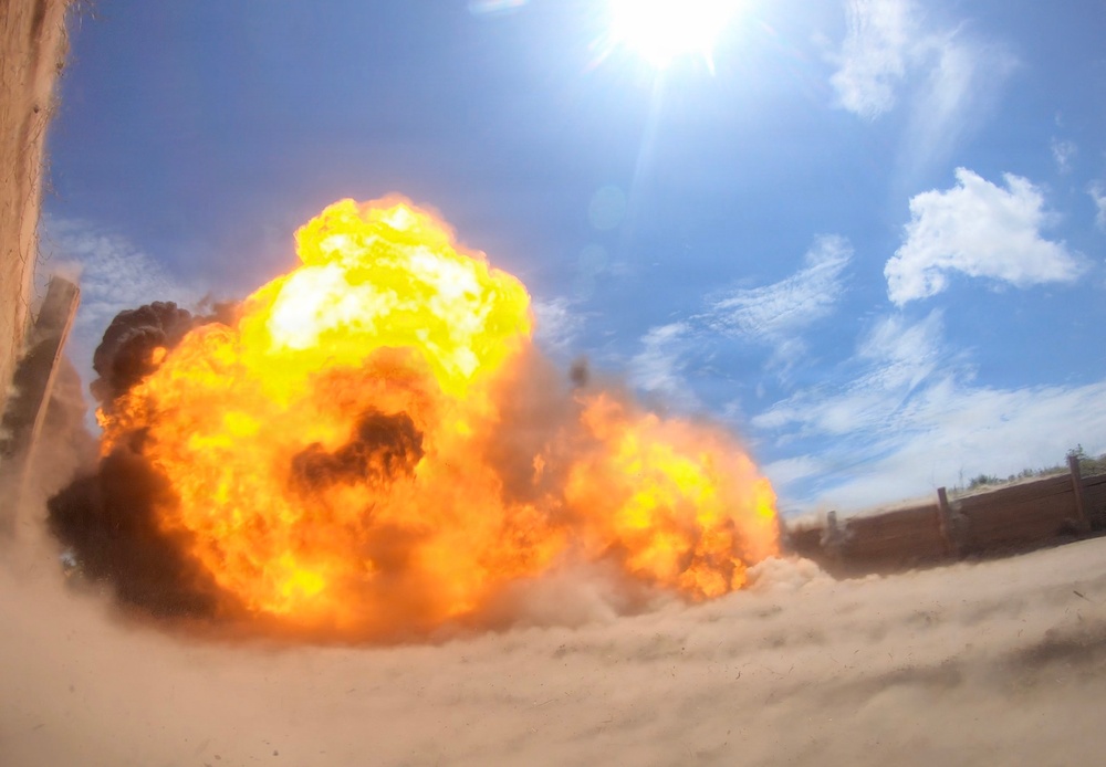 Engineers detonate confidence, shape and crater charges.