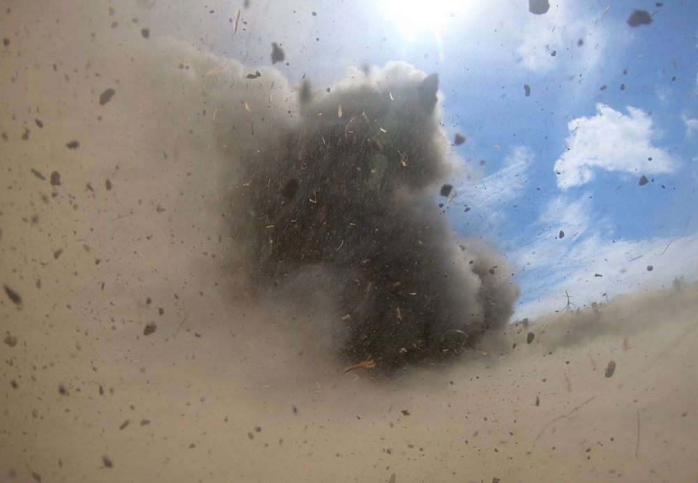 Engineers detonate confidence, shape and crater charges.