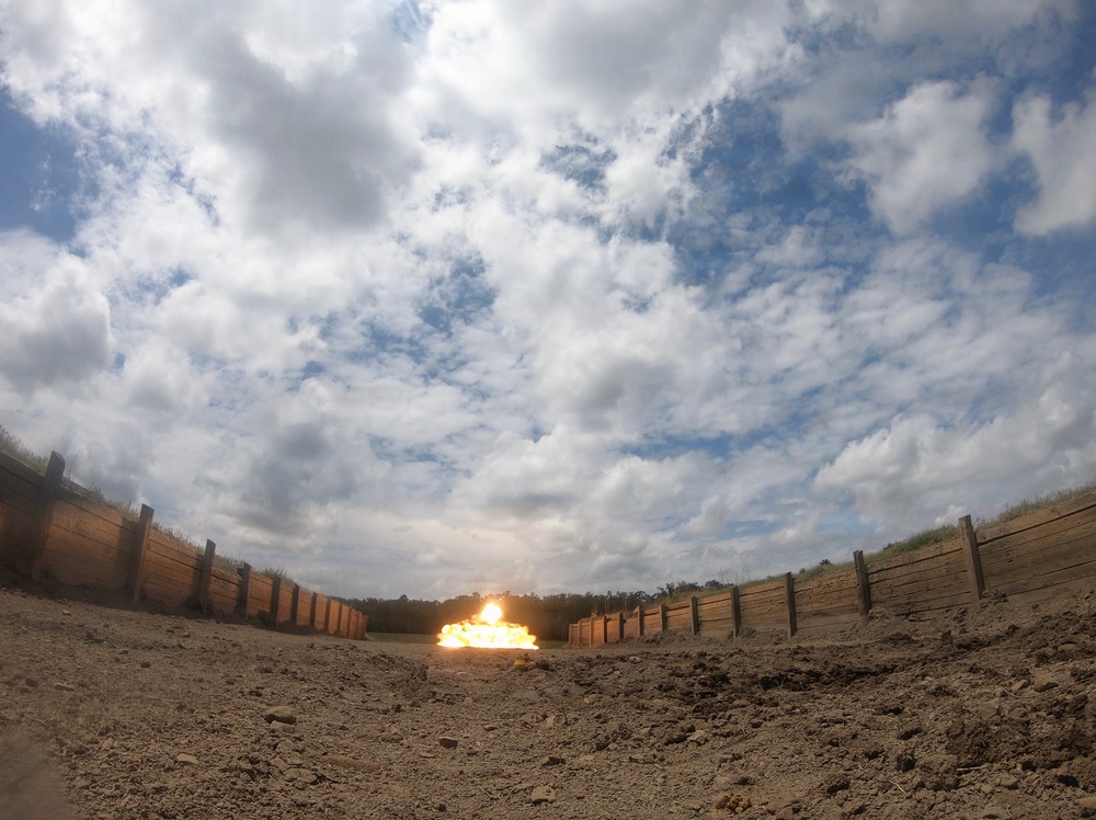 Engineers detonate confidence, shape and crater charges.