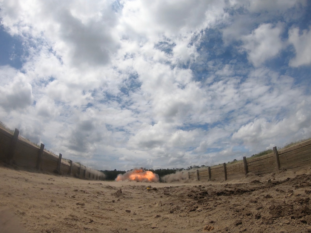 Engineers detonate confidence, shape and crater charges.