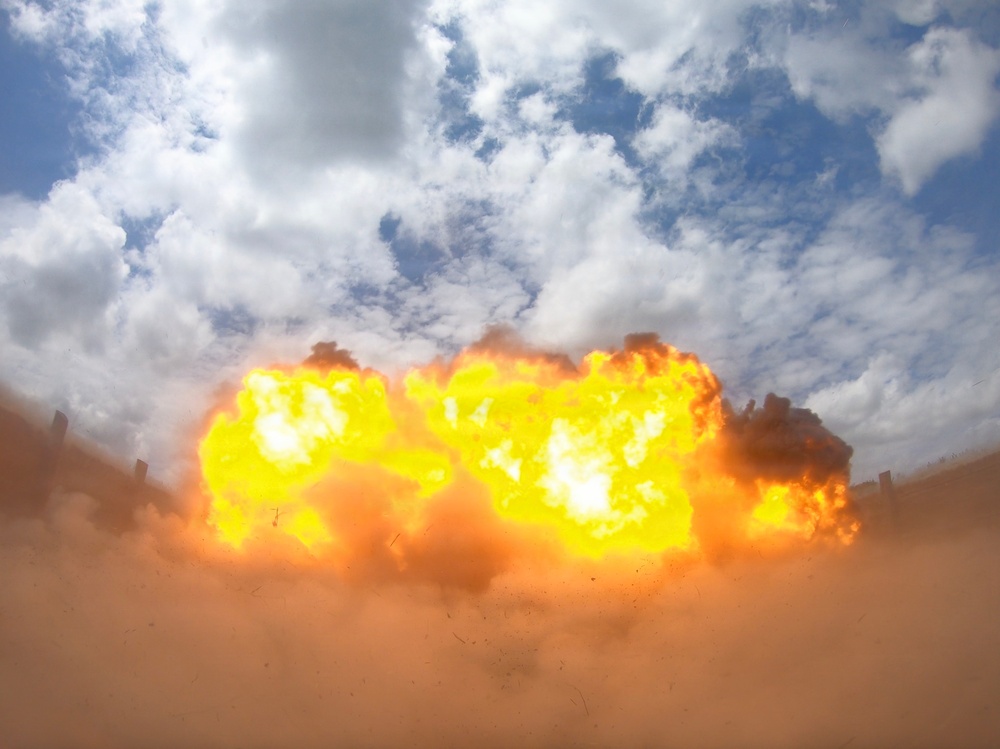 Engineers detonate confidence, shape and crater charges.