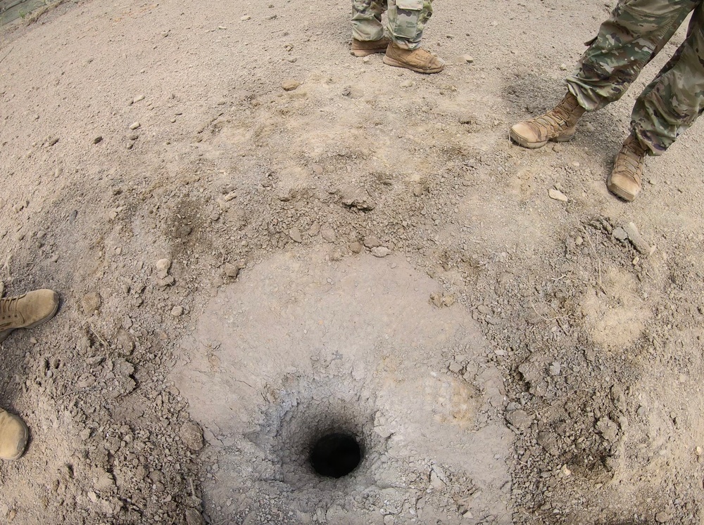 Engineers detonate confidence, shape and crater charges.