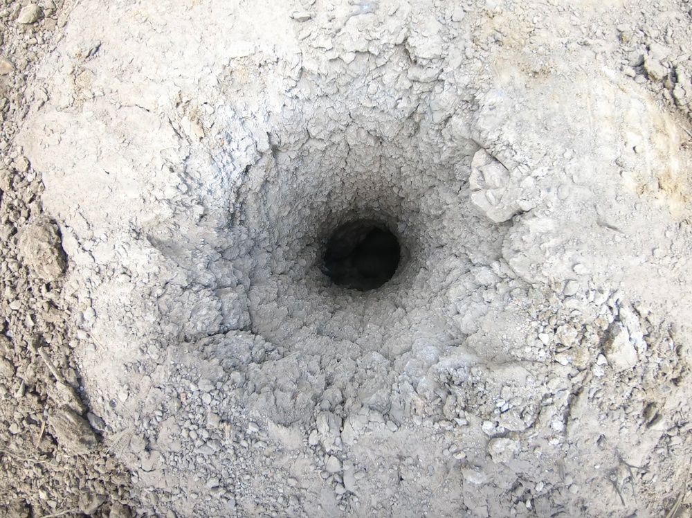 Engineers detonate confidence, shape and crater charges.