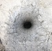 Engineers detonate confidence, shape and crater charges.