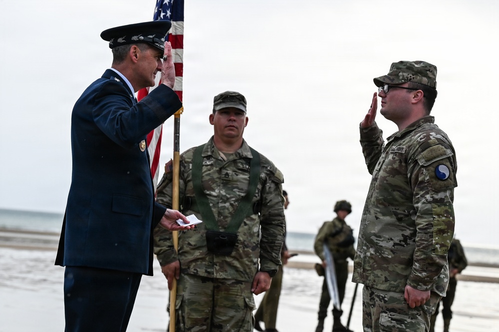 CNGB officiates 29th ID Soldier’s reenlistment on Omaha Beach