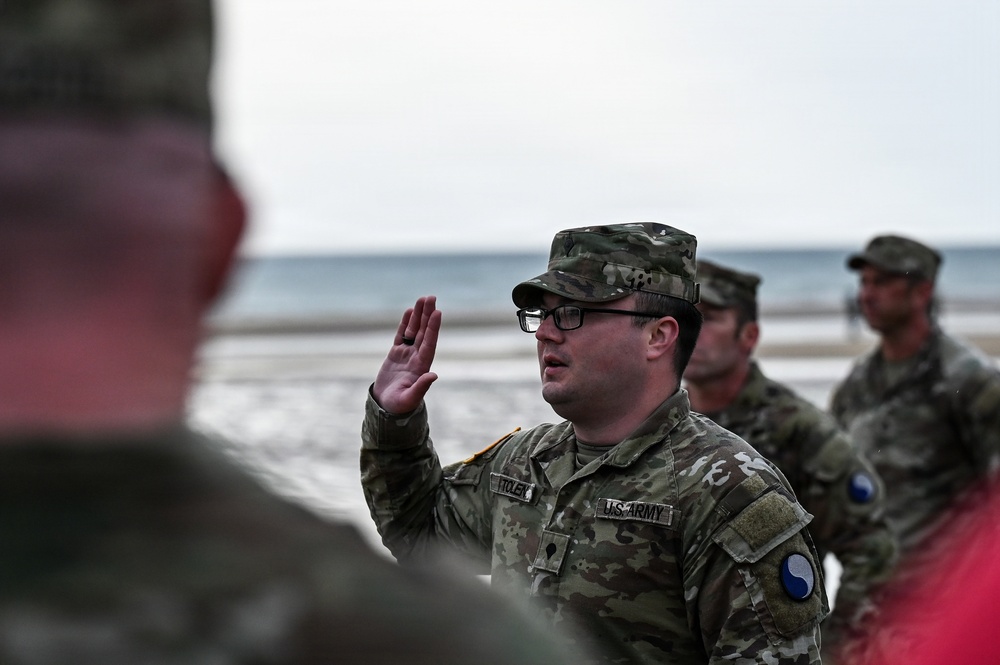 CNGB officiates 29th ID Soldier’s reenlistment on Omaha Beach