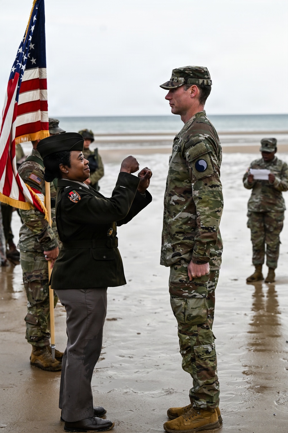 Birckhead promotes top Soldier to SGT in Omaha Beach ceremony