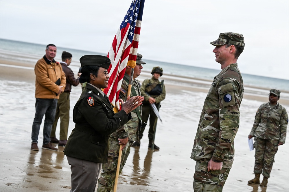 Birckhead promotes top Soldier to SGT in Omaha Beach ceremony