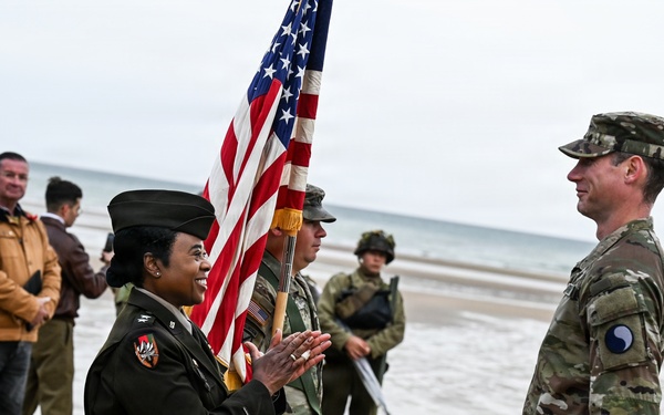 Birckhead promotes top Soldier to SGT in Omaha Beach ceremony