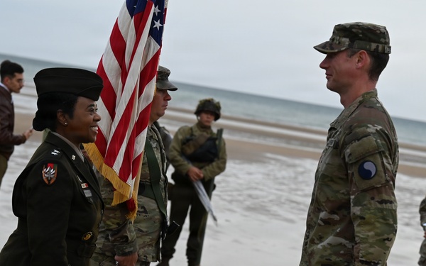 Birckhead promotes top Soldier to SGT in Omaha Beach ceremony
