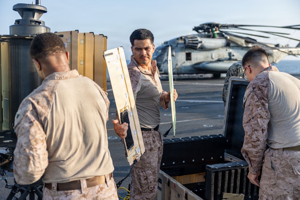 11th MEU Marines Assemble a Survey Radar Aboard USS Portland