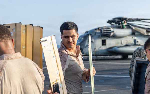 11th MEU Marines Assemble a Survey Radar Aboard USS Portland