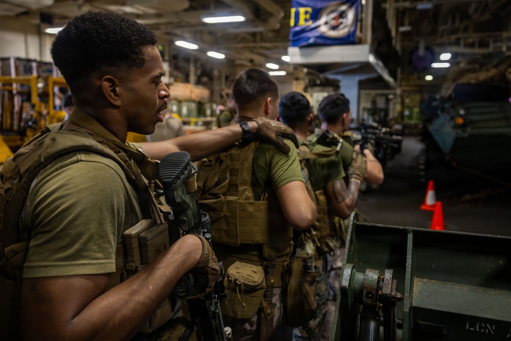 U.S. Marines Conduct Simulated Combat Drills Aboard USS Boxer