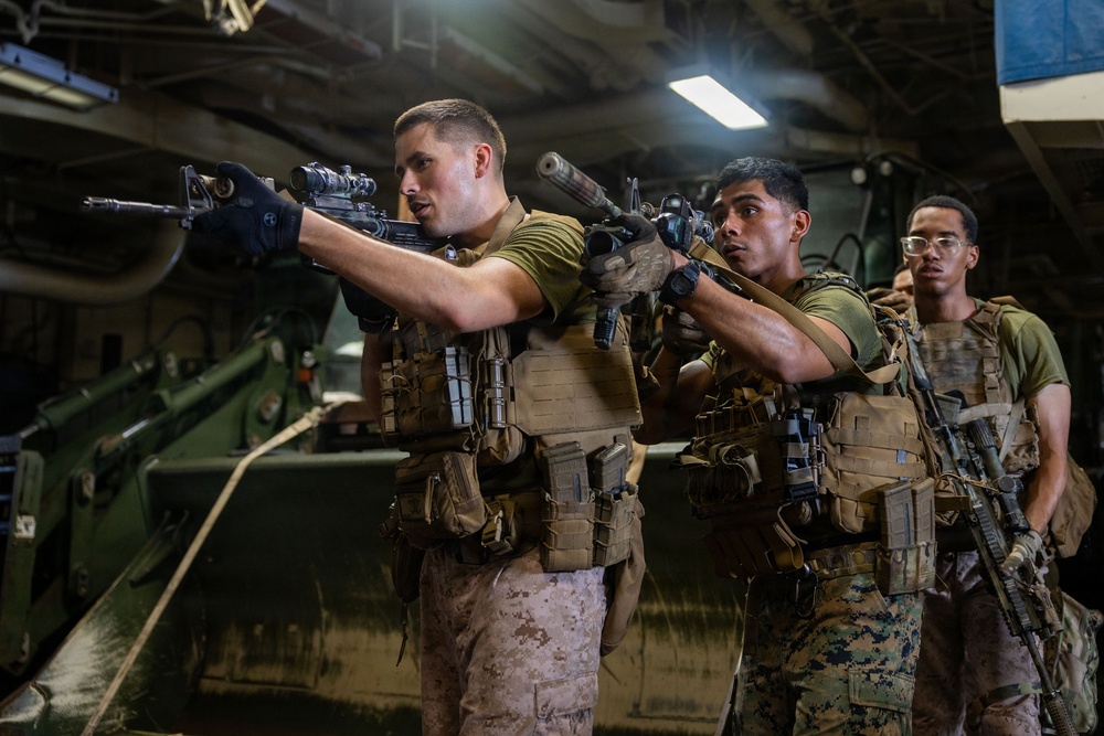 U.S. Marines Conduct Simulated Combat Drills Aboard USS Boxer