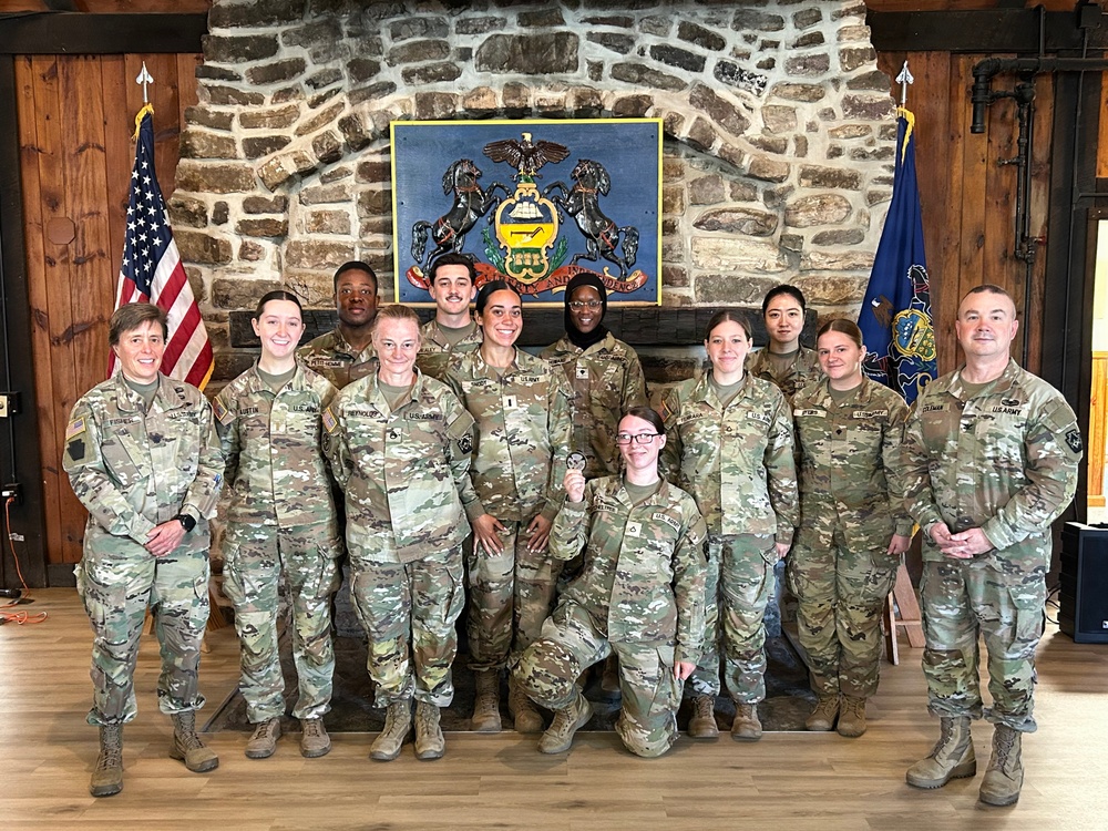 213th PC Soldiers receive coins for excellence