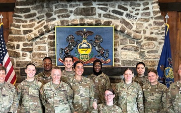 213th PC Soldiers receive coins for excellence
