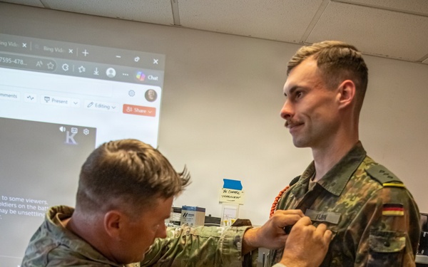German Army Exchange Officer Presented with Army Marksmanship Badge