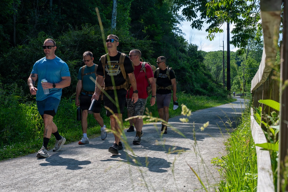 911 AW leaders host rucksack march