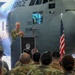 Lt. Col. John Jasper addresses airmen during ceremony at 153rd Airlift Wing hangar