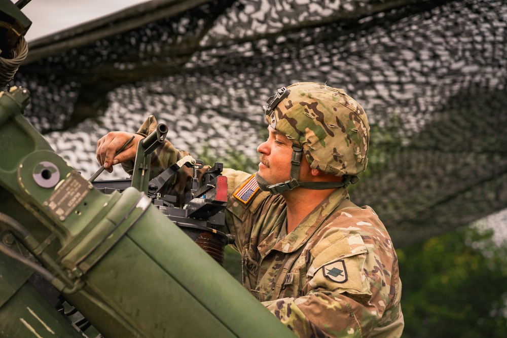 206th Field Artillery Conducts Night Fire During Annual Training