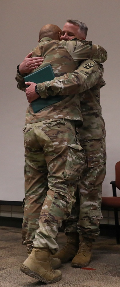 300th Military Intelligence Brigade (Linguist) bids farewell to Col. Scott Chalmers and welcomes Lt. Col. John Isom in a combined retirement and change of command ceremony