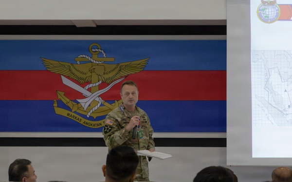 U.S. service members deliver briefs during Bersama Warrior 2026