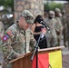Maj. Hicks leads prayer during Bulldog change of command ceremony