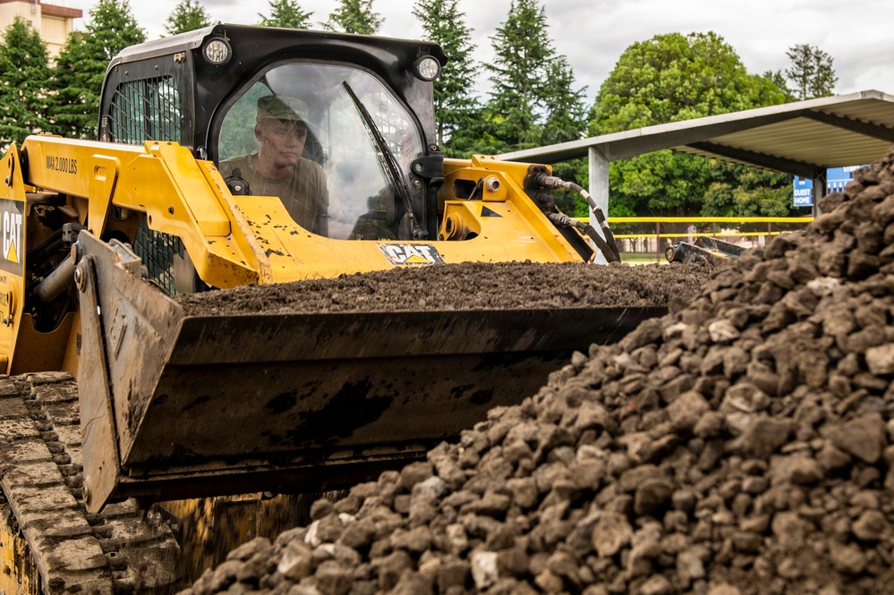 Civil engineers prepare concrete pad