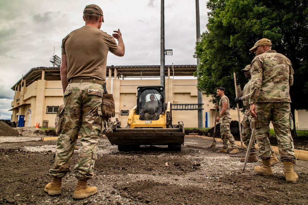 Civil engineers prepare concrete pad