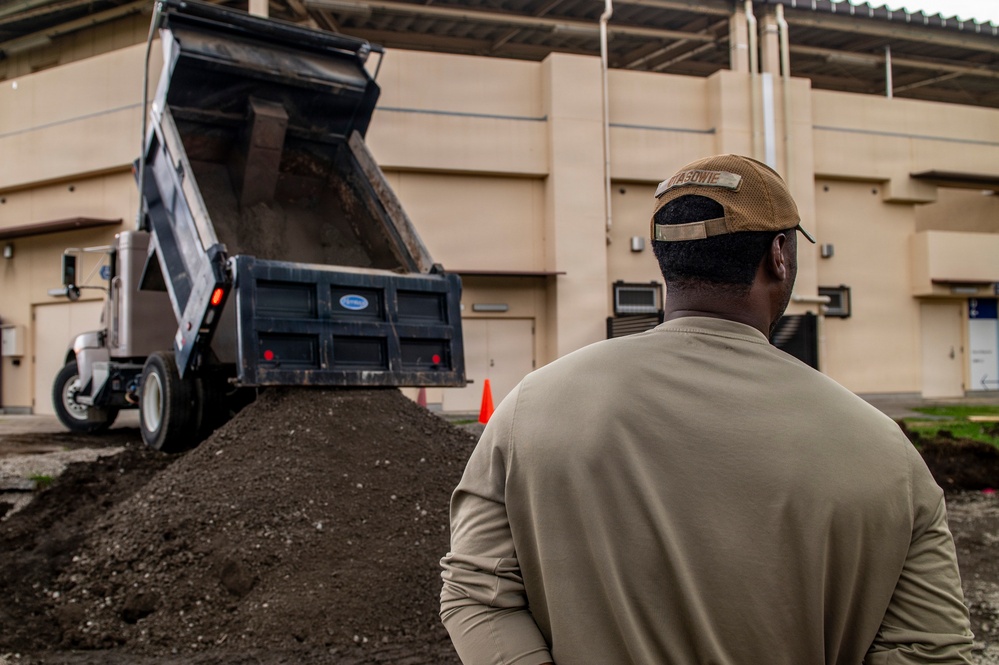 Civil engineers prepare concrete pad