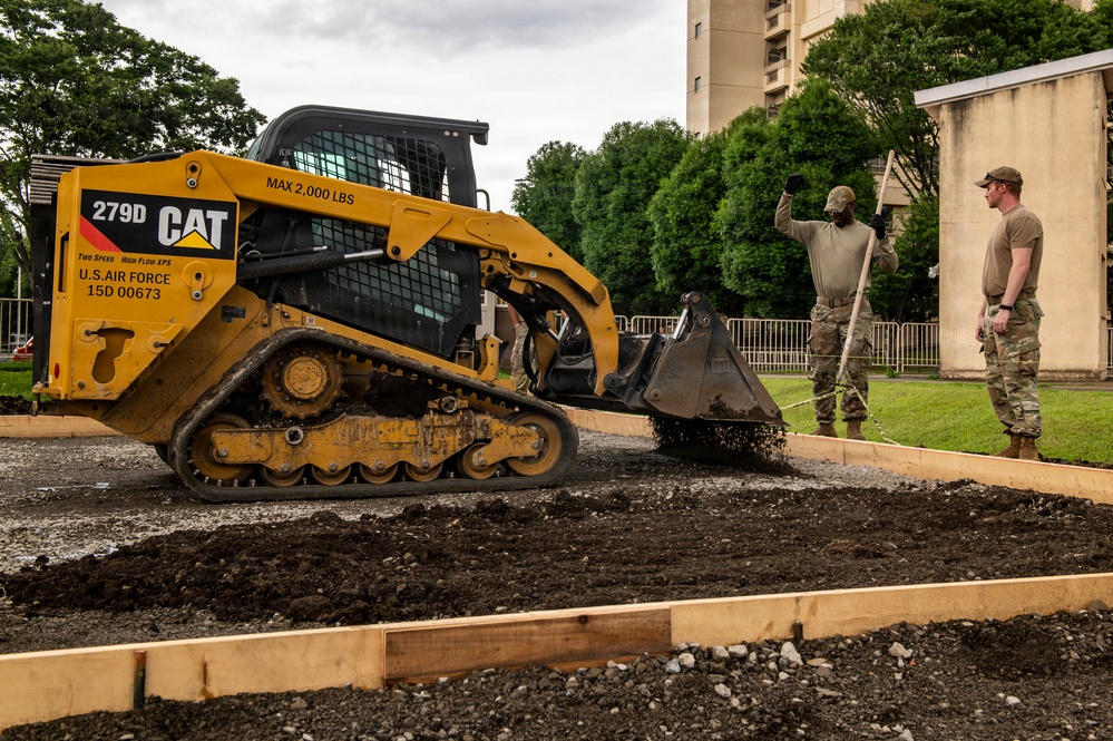 Civil engineers prepare concrete pad