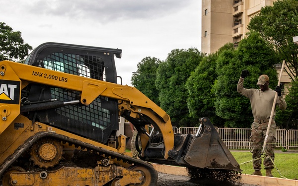 Civil engineers prepare concrete pad