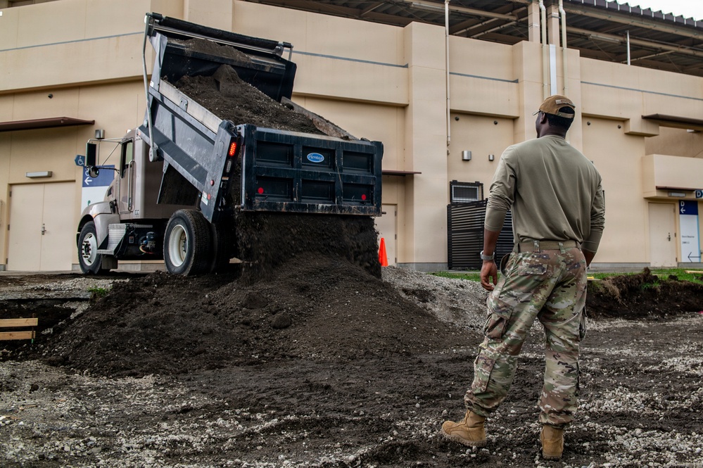 Civil engineers prepare concrete pad