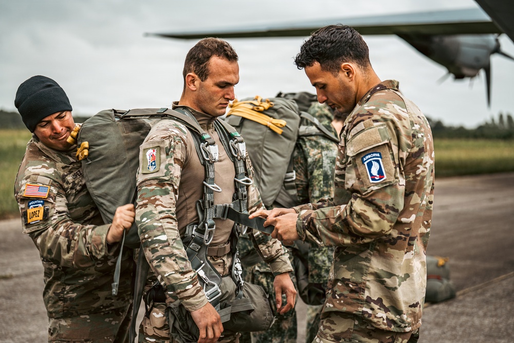 U.S. and Allied Paratroopers jump into Iron Mike drop zone for D-Day 82