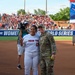 OC-ALC Commander Throws Ceremonial First Pitch at Women's College World Series Finals